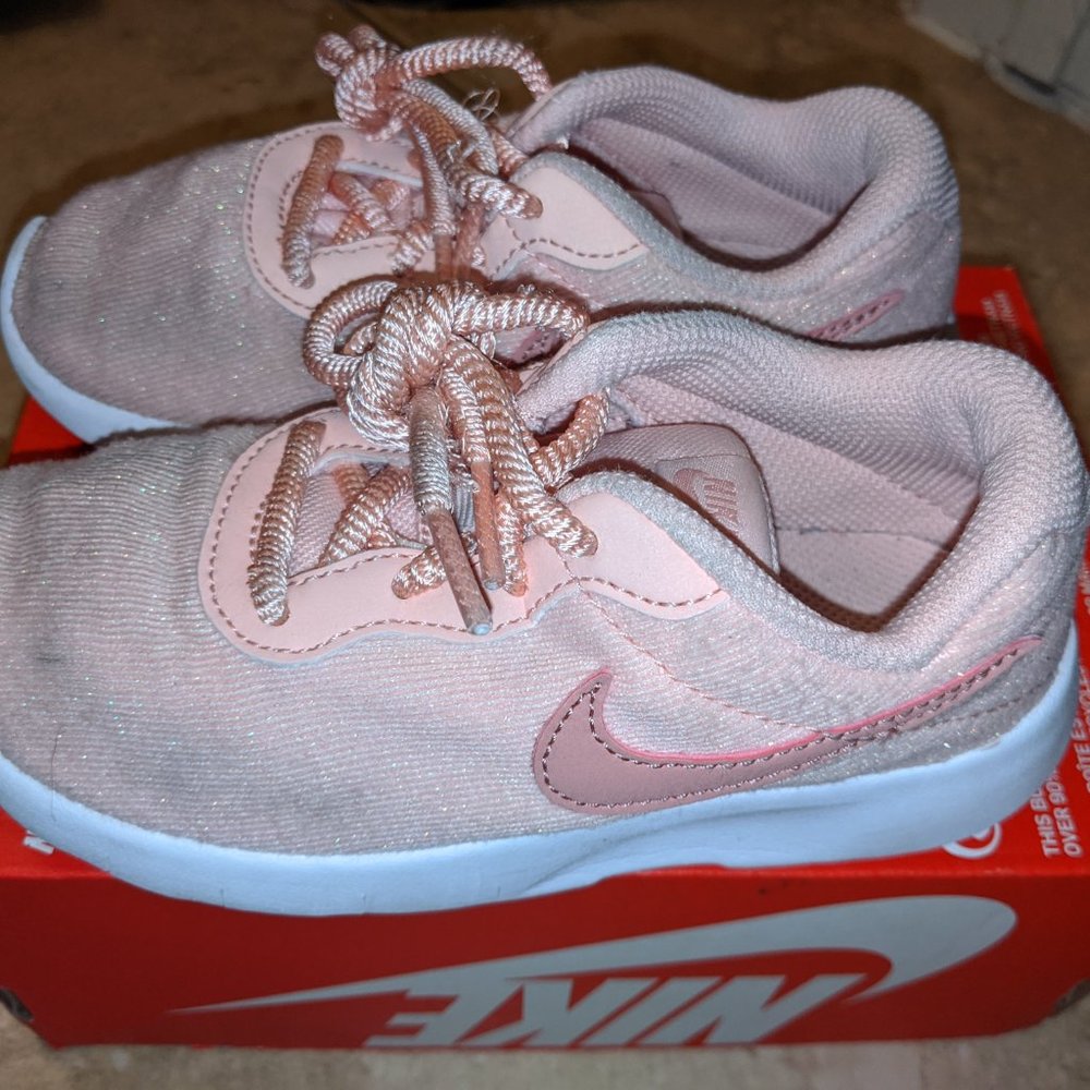 Pink Nike toddler tennis shoes. Size 11c